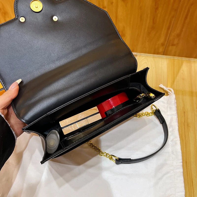 Chained Medallion Clutch