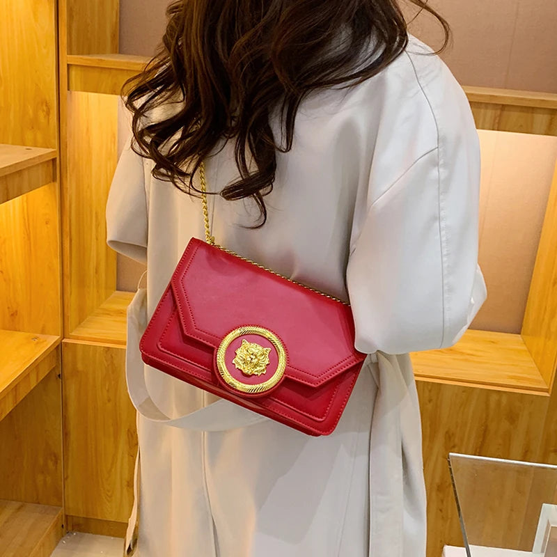 Chained Medallion Clutch